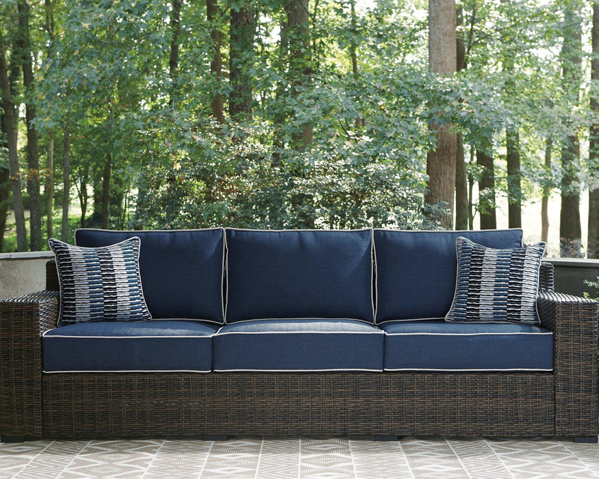 Grasson Lane Sofa with Cushion - Premium Outdoor Seating from Ashley Furniture - Just $1092.44! Shop now at Furniture Wholesale Plus  We are the best furniture store in Nashville, Hendersonville, Goodlettsville, Madison, Antioch, Mount Juliet, Lebanon, Gallatin, Springfield, Murfreesboro, Franklin, Brentwood