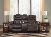 Warnerton Power Reclining Loveseat with Console - Premium Loveseat from Ashley Furniture - Just $1425.62! Shop now at Furniture Wholesale Plus  We are the best furniture store in Nashville, Hendersonville, Goodlettsville, Madison, Antioch, Mount Juliet, Lebanon, Gallatin, Springfield, Murfreesboro, Franklin, Brentwood