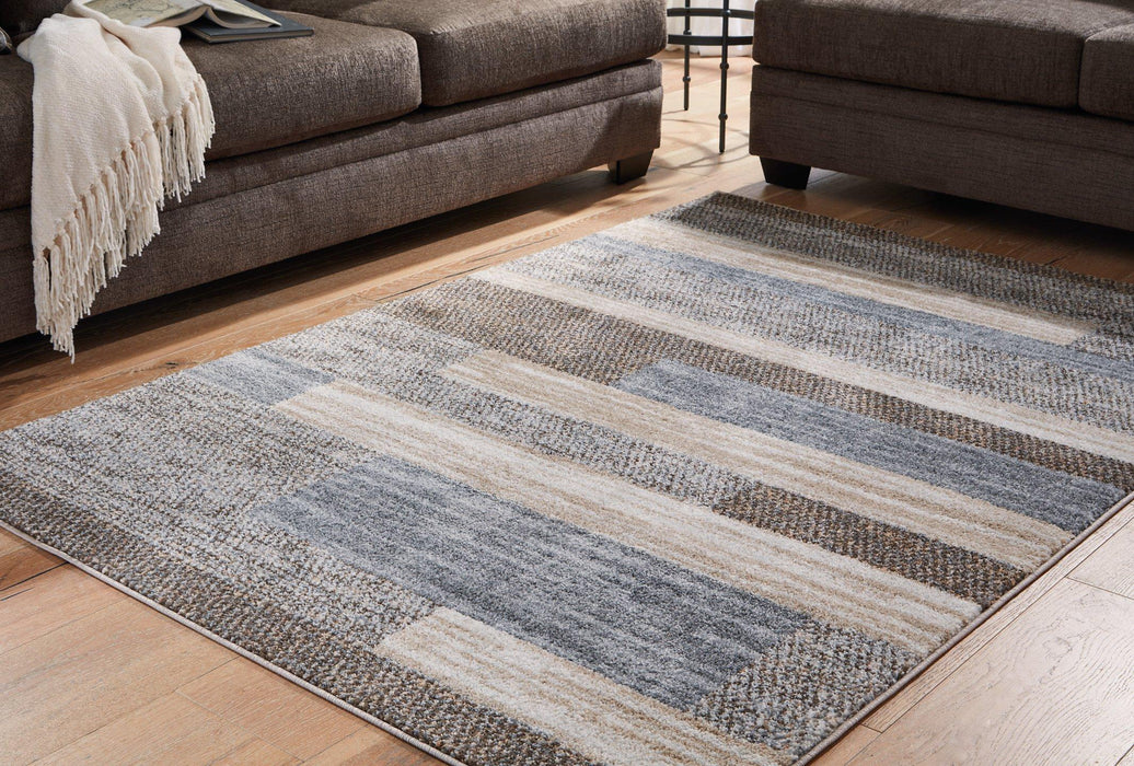 Sethburn Rug - Premium Rug Medium from Ashley Furniture - Just $90.36! Shop now at Furniture Wholesale Plus  We are the best furniture store in Nashville, Hendersonville, Goodlettsville, Madison, Antioch, Mount Juliet, Lebanon, Gallatin, Springfield, Murfreesboro, Franklin, Brentwood