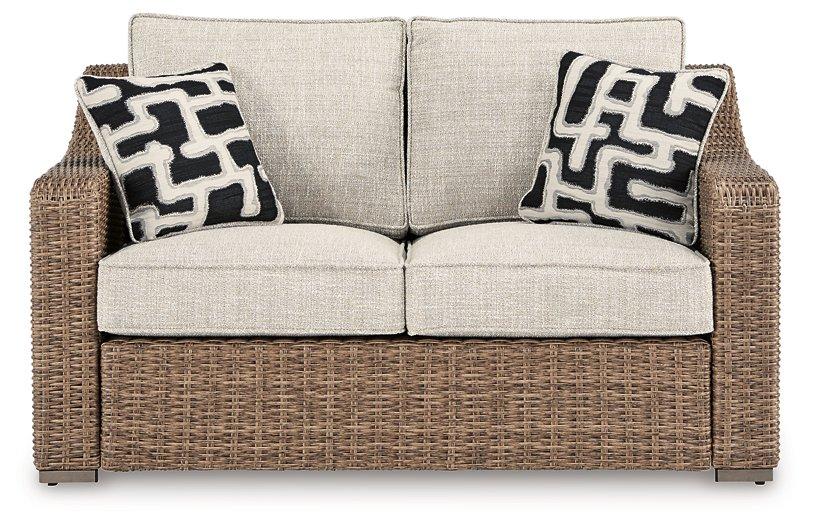 Beachcroft Outdoor Loveseat with Cushion - Premium Outdoor Loveseat from Ashley Furniture - Just $970.15! Shop now at Furniture Wholesale Plus  We are the best furniture store in Nashville, Hendersonville, Goodlettsville, Madison, Antioch, Mount Juliet, Lebanon, Gallatin, Springfield, Murfreesboro, Franklin, Brentwood