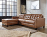 Baskove Sectional with Chaise - Premium Sectional from Ashley Furniture - Just $1667.12! Shop now at Furniture Wholesale Plus  We are the best furniture store in Nashville, Hendersonville, Goodlettsville, Madison, Antioch, Mount Juliet, Lebanon, Gallatin, Springfield, Murfreesboro, Franklin, Brentwood