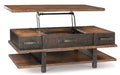 Stanah Coffee Table with Lift Top - Premium Cocktail Table Lift from Ashley Furniture - Just $408.03! Shop now at Furniture Wholesale Plus  We are the best furniture store in Nashville, Hendersonville, Goodlettsville, Madison, Antioch, Mount Juliet, Lebanon, Gallatin, Springfield, Murfreesboro, Franklin, Brentwood