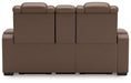 High Impact Power Reclining Loveseat with Console - Premium Loveseat from Ashley Furniture - Just $1552.73! Shop now at Furniture Wholesale Plus  We are the best furniture store in Nashville, Hendersonville, Goodlettsville, Madison, Antioch, Mount Juliet, Lebanon, Gallatin, Springfield, Murfreesboro, Franklin, Brentwood