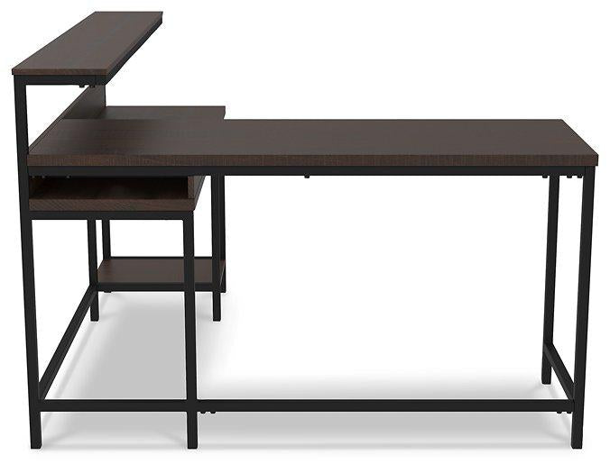 Camiburg Home Office L-Desk with Storage - Premium Desk from Ashley Furniture - Just $317.24! Shop now at Furniture Wholesale Plus  We are the best furniture store in Nashville, Hendersonville, Goodlettsville, Madison, Antioch, Mount Juliet, Lebanon, Gallatin, Springfield, Murfreesboro, Franklin, Brentwood