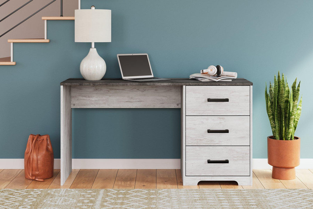 Shawburn 54" Home Office Desk - Premium Desk from Ashley Furniture - Just $176.01! Shop now at Furniture Wholesale Plus  We are the best furniture store in Nashville, Hendersonville, Goodlettsville, Madison, Antioch, Mount Juliet, Lebanon, Gallatin, Springfield, Murfreesboro, Franklin, Brentwood