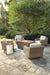 Beachcroft Beachcroft Fire Pit Table with Four Nuvella Swivel Lounge Chairs - Premium Outdoor Seating Set from Ashley Furniture - Just $4022.76! Shop now at Furniture Wholesale Plus  We are the best furniture store in Nashville, Hendersonville, Goodlettsville, Madison, Antioch, Mount Juliet, Lebanon, Gallatin, Springfield, Murfreesboro, Franklin, Brentwood