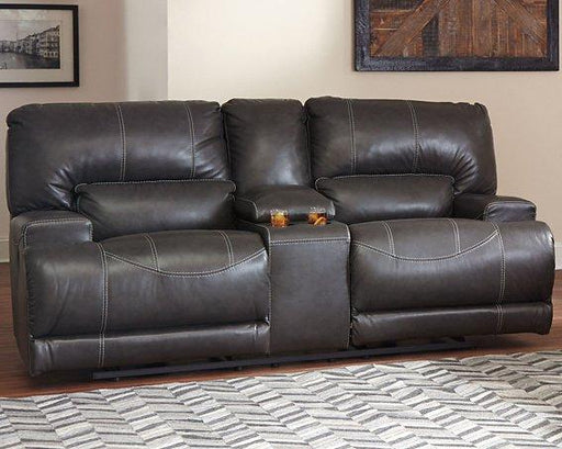 McCaskill Reclining Loveseat with Console - Premium Loveseat from Ashley Furniture - Just $1596.87! Shop now at Furniture Wholesale Plus  We are the best furniture store in Nashville, Hendersonville, Goodlettsville, Madison, Antioch, Mount Juliet, Lebanon, Gallatin, Springfield, Murfreesboro, Franklin, Brentwood