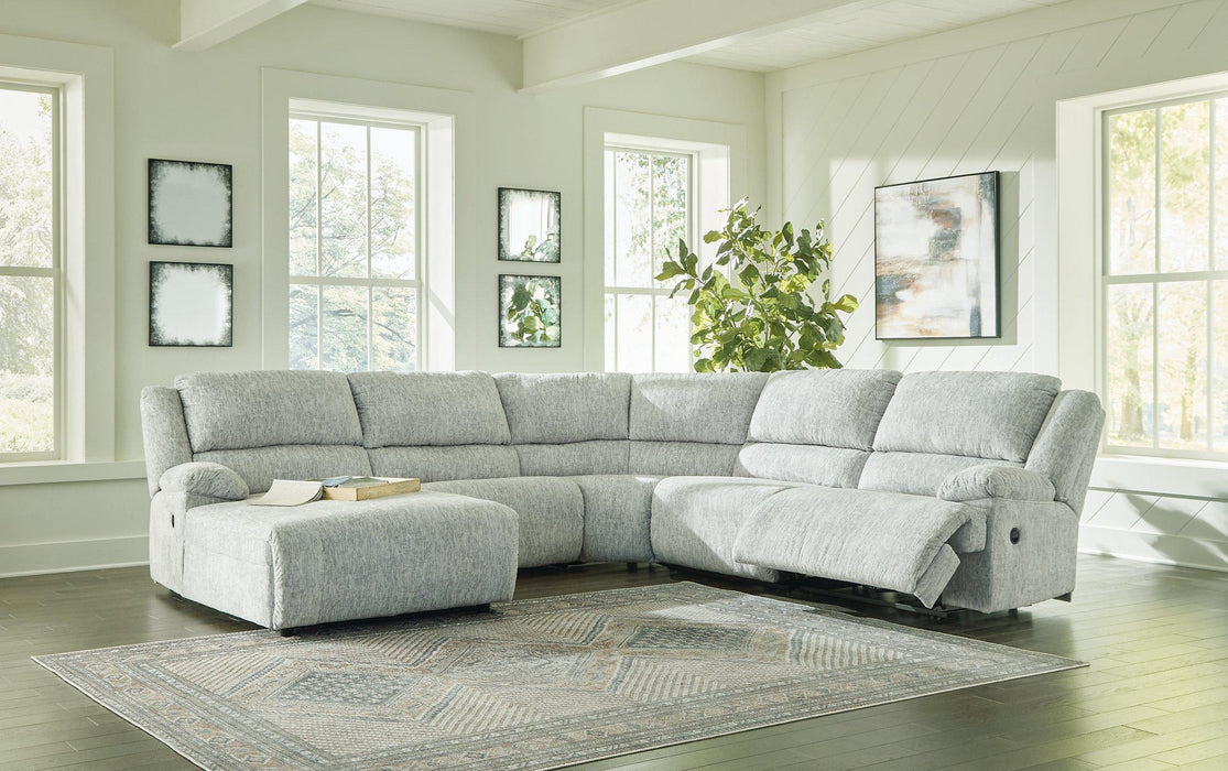 McClelland Reclining Sectional with Chaise - Premium Sectional from Ashley Furniture - Just $1521.90! Shop now at Furniture Wholesale Plus  We are the best furniture store in Nashville, Hendersonville, Goodlettsville, Madison, Antioch, Mount Juliet, Lebanon, Gallatin, Springfield, Murfreesboro, Franklin, Brentwood