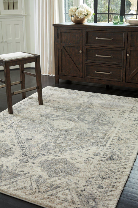 Precia 7'10" x 10'6" Rug - Premium Rug from Ashley Furniture - Just $445.72! Shop now at Furniture Wholesale Plus  We are the best furniture store in Nashville, Hendersonville, Goodlettsville, Madison, Antioch, Mount Juliet, Lebanon, Gallatin, Springfield, Murfreesboro, Franklin, Brentwood