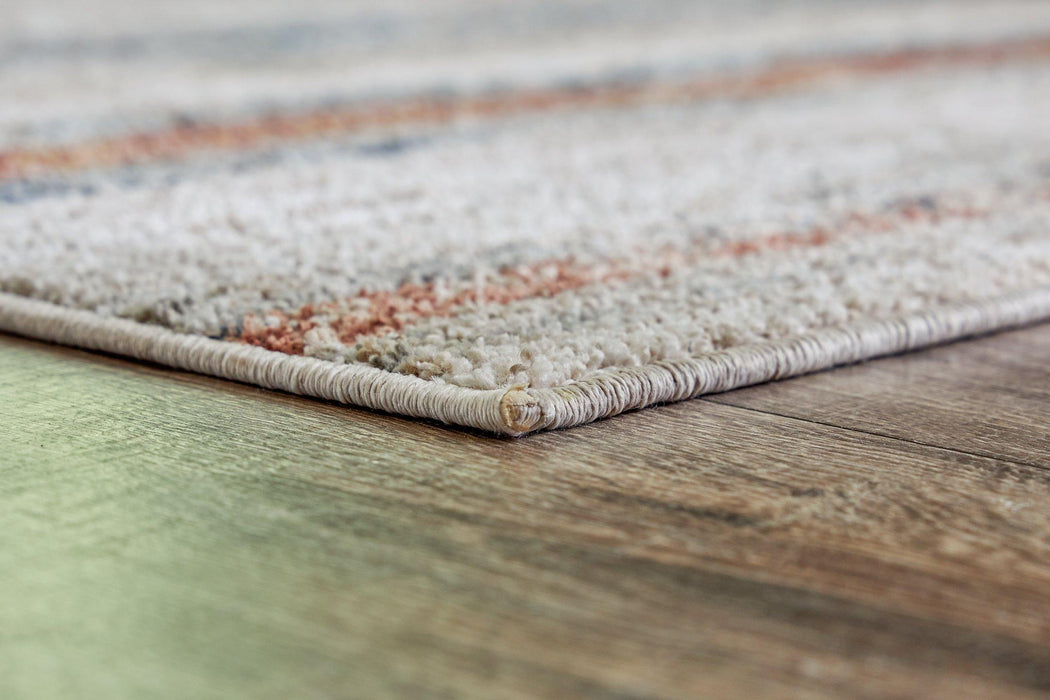 Kemart Medium Rug - Premium Rug Medium from Ashley Furniture - Just $120.37! Shop now at Furniture Wholesale Plus  We are the best furniture store in Nashville, Hendersonville, Goodlettsville, Madison, Antioch, Mount Juliet, Lebanon, Gallatin, Springfield, Murfreesboro, Franklin, Brentwood