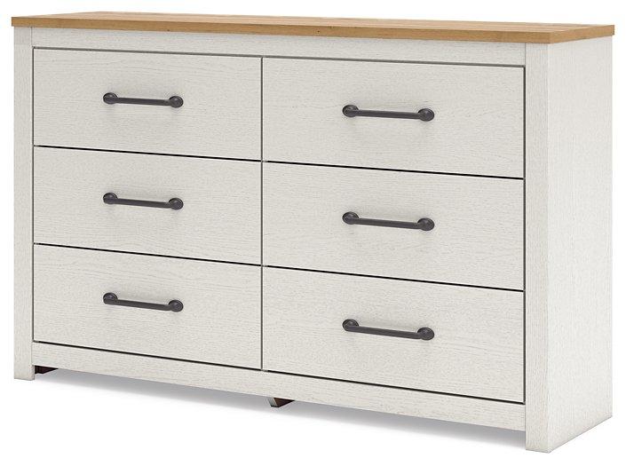 Linnocreek Dresser - Premium Dresser from Ashley Furniture - Just $325.80! Shop now at Furniture Wholesale Plus  We are the best furniture store in Nashville, Hendersonville, Goodlettsville, Madison, Antioch, Mount Juliet, Lebanon, Gallatin, Springfield, Murfreesboro, Franklin, Brentwood