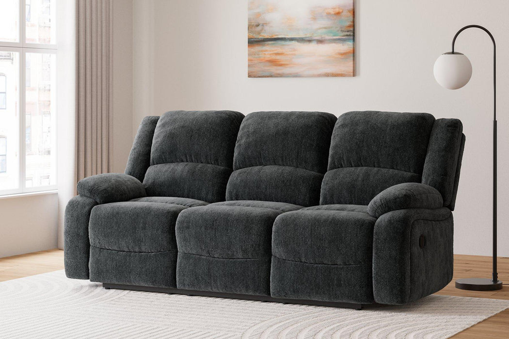 Draycoll Reclining Sofa - Premium Sofa from Ashley Furniture - Just $746.42! Shop now at Furniture Wholesale Plus  We are the best furniture store in Nashville, Hendersonville, Goodlettsville, Madison, Antioch, Mount Juliet, Lebanon, Gallatin, Springfield, Murfreesboro, Franklin, Brentwood