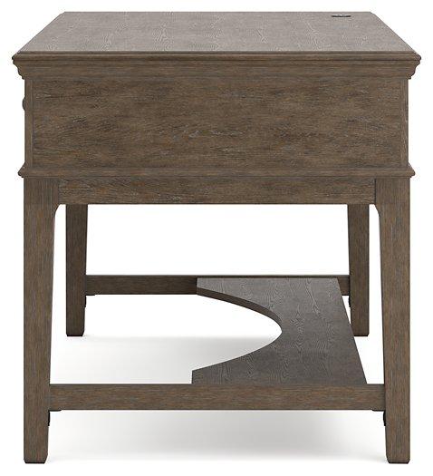 Janismore Home Office Storage Leg Desk - Premium Desk from Ashley Furniture - Just $579.20! Shop now at Furniture Wholesale Plus  We are the best furniture store in Nashville, Hendersonville, Goodlettsville, Madison, Antioch, Mount Juliet, Lebanon, Gallatin, Springfield, Murfreesboro, Franklin, Brentwood