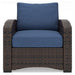 Windglow Outdoor Lounge Chair with Cushion - Premium Outdoor Seating from Ashley Furniture - Just $321.78! Shop now at Furniture Wholesale Plus  We are the best furniture store in Nashville, Hendersonville, Goodlettsville, Madison, Antioch, Mount Juliet, Lebanon, Gallatin, Springfield, Murfreesboro, Franklin, Brentwood