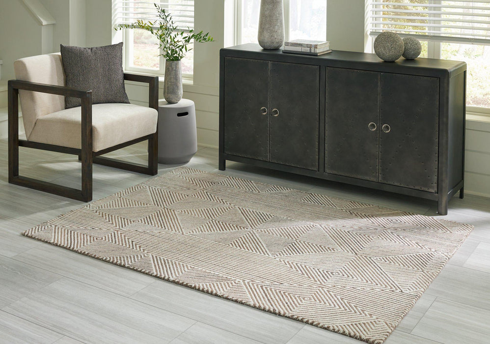 Jadott Rug - Premium Rug Medium from Ashley Furniture - Just $175.10! Shop now at Furniture Wholesale Plus  We are the best furniture store in Nashville, Hendersonville, Goodlettsville, Madison, Antioch, Mount Juliet, Lebanon, Gallatin, Springfield, Murfreesboro, Franklin, Brentwood