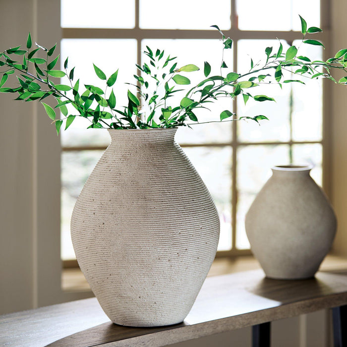 Hannela Vase - Premium Vase from Ashley Furniture - Just $70.83! Shop now at Furniture Wholesale Plus  We are the best furniture store in Nashville, Hendersonville, Goodlettsville, Madison, Antioch, Mount Juliet, Lebanon, Gallatin, Springfield, Murfreesboro, Franklin, Brentwood