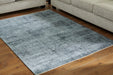 Rhysill 5' x 7' Rug - Premium Rug from Ashley Furniture - Just $108.02! Shop now at Furniture Wholesale Plus  We are the best furniture store in Nashville, Hendersonville, Goodlettsville, Madison, Antioch, Mount Juliet, Lebanon, Gallatin, Springfield, Murfreesboro, Franklin, Brentwood