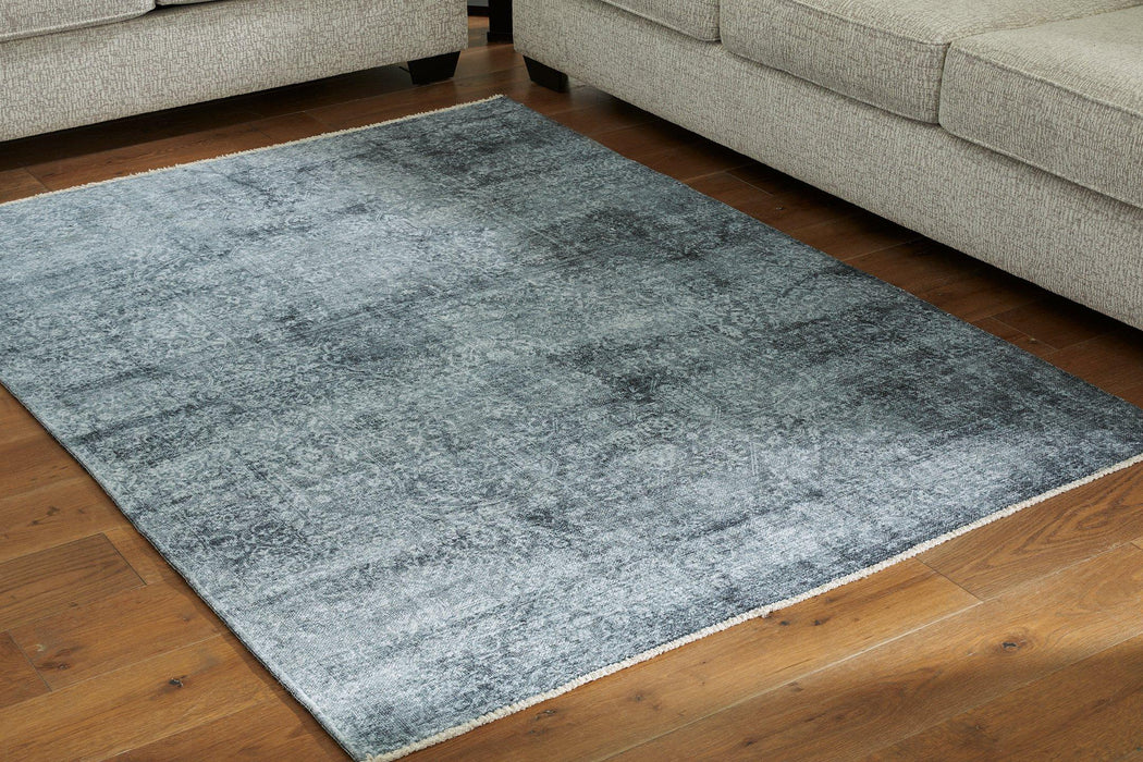 Rhysill 8' x 10' Rug - Premium Rug from Ashley Furniture - Just $225.04! Shop now at Furniture Wholesale Plus  We are the best furniture store in Nashville, Hendersonville, Goodlettsville, Madison, Antioch, Mount Juliet, Lebanon, Gallatin, Springfield, Murfreesboro, Franklin, Brentwood