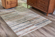 Kemart Large Rug - Premium Rug Large from Ashley Furniture - Just $240.93! Shop now at Furniture Wholesale Plus  We are the best furniture store in Nashville, Hendersonville, Goodlettsville, Madison, Antioch, Mount Juliet, Lebanon, Gallatin, Springfield, Murfreesboro, Franklin, Brentwood