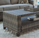 Oasis Court Outdoor Sofa/Chairs/Table Set (Set of 4) - Premium Outdoor Seating Set from Ashley Furniture - Just $1517.08! Shop now at Furniture Wholesale Plus  We are the best furniture store in Nashville, Hendersonville, Goodlettsville, Madison, Antioch, Mount Juliet, Lebanon, Gallatin, Springfield, Murfreesboro, Franklin, Brentwood