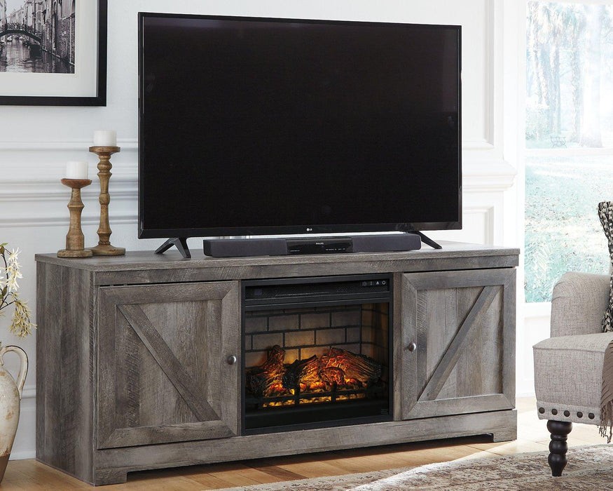 Wynnlow 63" TV Stand with Electric Fireplace - Premium TV Stand from Ashley Furniture - Just $603.35! Shop now at Furniture Wholesale Plus  We are the best furniture store in Nashville, Hendersonville, Goodlettsville, Madison, Antioch, Mount Juliet, Lebanon, Gallatin, Springfield, Murfreesboro, Franklin, Brentwood