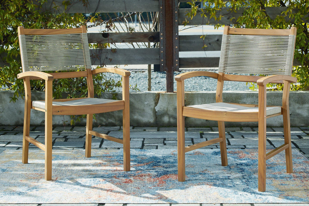 Janiyah Outdoor Dining Arm Chair (Set of 2) - Premium Outdoor Dining Chair from Ashley Furniture - Just $279.55! Shop now at Furniture Wholesale Plus  We are the best furniture store in Nashville, Hendersonville, Goodlettsville, Madison, Antioch, Mount Juliet, Lebanon, Gallatin, Springfield, Murfreesboro, Franklin, Brentwood