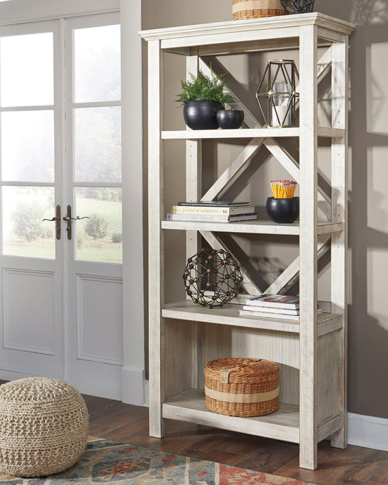 Carynhurst 75" Bookcase - Premium Bookcase from Ashley Furniture - Just $414.29! Shop now at Furniture Wholesale Plus  We are the best furniture store in Nashville, Hendersonville, Goodlettsville, Madison, Antioch, Mount Juliet, Lebanon, Gallatin, Springfield, Murfreesboro, Franklin, Brentwood