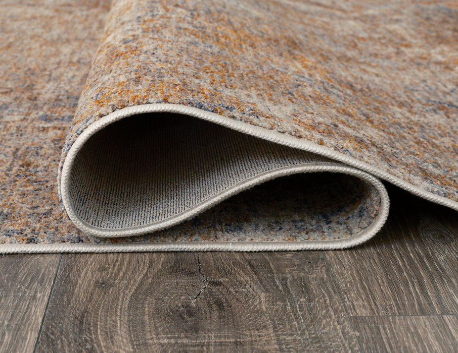 Mauville 7'10" x 10'4" Rug - Premium Rug from Ashley Furniture - Just $286.83! Shop now at Furniture Wholesale Plus  We are the best furniture store in Nashville, Hendersonville, Goodlettsville, Madison, Antioch, Mount Juliet, Lebanon, Gallatin, Springfield, Murfreesboro, Franklin, Brentwood