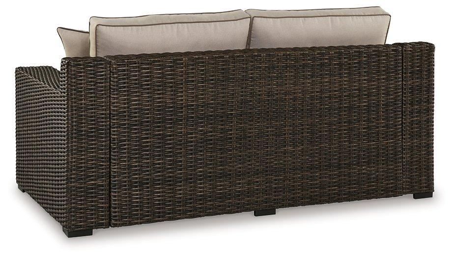 Coastline Bay Outdoor Loveseat with Cushion - Premium Outdoor Seating from Ashley Furniture - Just $970.15! Shop now at Furniture Wholesale Plus  We are the best furniture store in Nashville, Hendersonville, Goodlettsville, Madison, Antioch, Mount Juliet, Lebanon, Gallatin, Springfield, Murfreesboro, Franklin, Brentwood