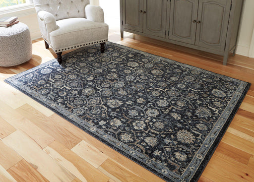 Hilcott 5'3" x 7'3" Rug - Premium Rug from Ashley Furniture - Just $249.25! Shop now at Furniture Wholesale Plus  We are the best furniture store in Nashville, Hendersonville, Goodlettsville, Madison, Antioch, Mount Juliet, Lebanon, Gallatin, Springfield, Murfreesboro, Franklin, Brentwood