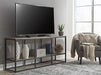 Wadeworth 65" TV Stand - Premium TV Stand from Ashley Furniture - Just $230.74! Shop now at Furniture Wholesale Plus  We are the best furniture store in Nashville, Hendersonville, Goodlettsville, Madison, Antioch, Mount Juliet, Lebanon, Gallatin, Springfield, Murfreesboro, Franklin, Brentwood