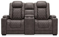 HyllMont Power Reclining Loveseat with Console - Premium Loveseat from Ashley Furniture - Just $1333.82! Shop now at Furniture Wholesale Plus  We are the best furniture store in Nashville, Hendersonville, Goodlettsville, Madison, Antioch, Mount Juliet, Lebanon, Gallatin, Springfield, Murfreesboro, Franklin, Brentwood