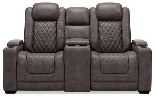 HyllMont Power Reclining Loveseat with Console - Premium Loveseat from Ashley Furniture - Just $1333.82! Shop now at Furniture Wholesale Plus  We are the best furniture store in Nashville, Hendersonville, Goodlettsville, Madison, Antioch, Mount Juliet, Lebanon, Gallatin, Springfield, Murfreesboro, Franklin, Brentwood