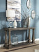 Johnelle Sofa Table - Premium Sofa Table from Ashley Furniture - Just $370.95! Shop now at Furniture Wholesale Plus  We are the best furniture store in Nashville, Hendersonville, Goodlettsville, Madison, Antioch, Mount Juliet, Lebanon, Gallatin, Springfield, Murfreesboro, Franklin, Brentwood