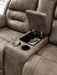 Stoneland Power Reclining Loveseat with Console - Premium Loveseat from Ashley Furniture - Just $970.15! Shop now at Furniture Wholesale Plus  We are the best furniture store in Nashville, Hendersonville, Goodlettsville, Madison, Antioch, Mount Juliet, Lebanon, Gallatin, Springfield, Murfreesboro, Franklin, Brentwood