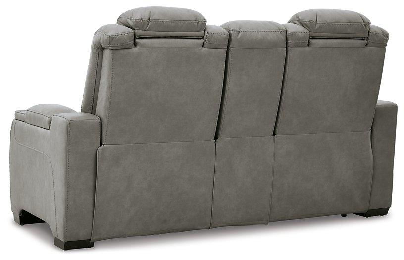 The Man-Den Power Reclining Loveseat with Console - Premium Loveseat from Ashley Furniture - Just $2152.97! Shop now at Furniture Wholesale Plus  We are the best furniture store in Nashville, Hendersonville, Goodlettsville, Madison, Antioch, Mount Juliet, Lebanon, Gallatin, Springfield, Murfreesboro, Franklin, Brentwood