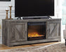 Wynnlow 63" TV Stand with Electric Fireplace - Premium TV Stand from Ashley Furniture - Just $603.35! Shop now at Furniture Wholesale Plus  We are the best furniture store in Nashville, Hendersonville, Goodlettsville, Madison, Antioch, Mount Juliet, Lebanon, Gallatin, Springfield, Murfreesboro, Franklin, Brentwood