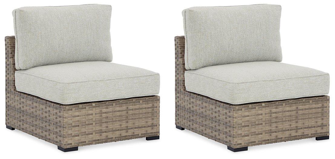 Calworth Outdoor Armless Chair with Cushion (Set of 2) - Premium Outdoor Seating from Ashley Furniture - Just $345.20! Shop now at Furniture Wholesale Plus  We are the best furniture store in Nashville, Hendersonville, Goodlettsville, Madison, Antioch, Mount Juliet, Lebanon, Gallatin, Springfield, Murfreesboro, Franklin, Brentwood