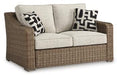 Beachcroft Outdoor Loveseat with Cushion - Premium Outdoor Loveseat from Ashley Furniture - Just $970.15! Shop now at Furniture Wholesale Plus  We are the best furniture store in Nashville, Hendersonville, Goodlettsville, Madison, Antioch, Mount Juliet, Lebanon, Gallatin, Springfield, Murfreesboro, Franklin, Brentwood