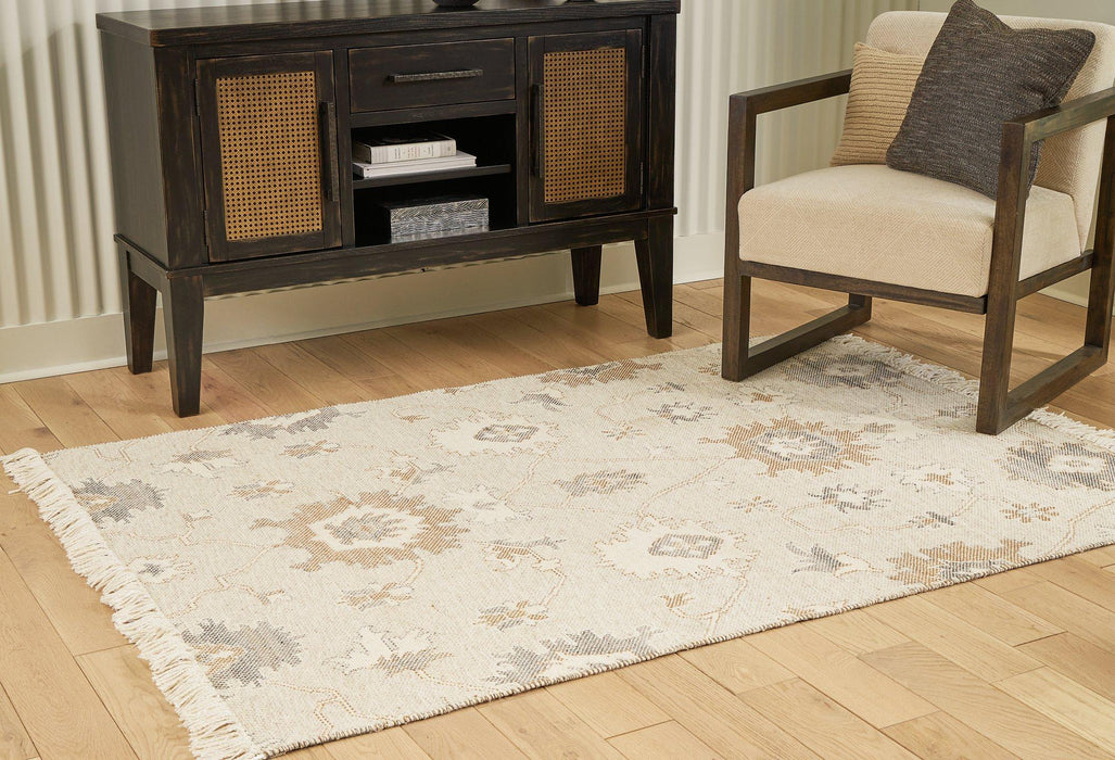 Calkin 5' x 7' Rug - Premium Rug from Ashley Furniture - Just $146.86! Shop now at Furniture Wholesale Plus  We are the best furniture store in Nashville, Hendersonville, Goodlettsville, Madison, Antioch, Mount Juliet, Lebanon, Gallatin, Springfield, Murfreesboro, Franklin, Brentwood