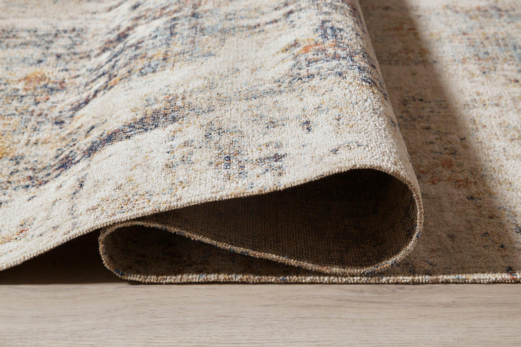 Jerelyn 5'3" x 7' Rug - Premium Rug from Ashley Furniture - Just $83.30! Shop now at Furniture Wholesale Plus  We are the best furniture store in Nashville, Hendersonville, Goodlettsville, Madison, Antioch, Mount Juliet, Lebanon, Gallatin, Springfield, Murfreesboro, Franklin, Brentwood