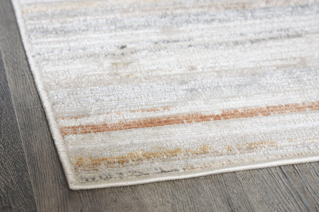 Artney Rug - Premium Rug Medium from Ashley Furniture - Just $111.55! Shop now at Furniture Wholesale Plus  We are the best furniture store in Nashville, Hendersonville, Goodlettsville, Madison, Antioch, Mount Juliet, Lebanon, Gallatin, Springfield, Murfreesboro, Franklin, Brentwood