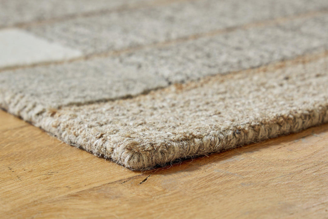 Abbotton Rug - Premium Rug from Ashley Furniture - Just $175.10! Shop now at Furniture Wholesale Plus  We are the best furniture store in Nashville, Hendersonville, Goodlettsville, Madison, Antioch, Mount Juliet, Lebanon, Gallatin, Springfield, Murfreesboro, Franklin, Brentwood