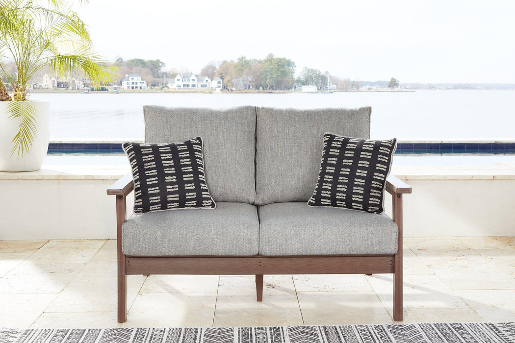 Emmeline Outdoor Loveseat with Cushion - Premium Outdoor Seating from Ashley Furniture - Just $880.12! Shop now at Furniture Wholesale Plus  We are the best furniture store in Nashville, Hendersonville, Goodlettsville, Madison, Antioch, Mount Juliet, Lebanon, Gallatin, Springfield, Murfreesboro, Franklin, Brentwood