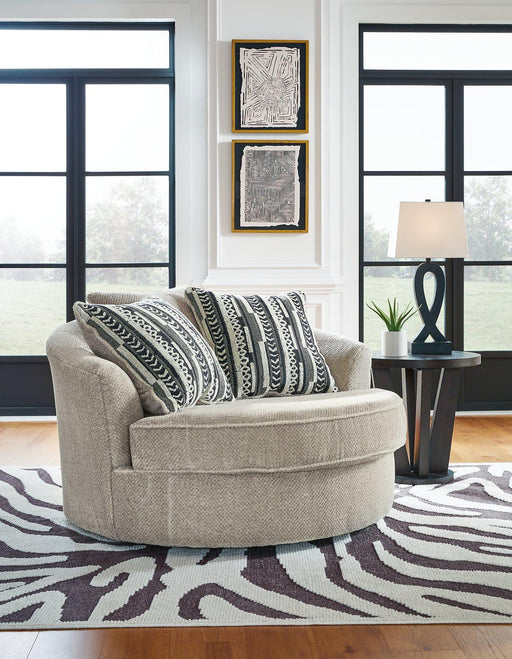 Calnita Oversized Swivel Accent Chair - Premium Chair from Ashley Furniture - Just $602.15! Shop now at Furniture Wholesale Plus  We are the best furniture store in Nashville, Hendersonville, Goodlettsville, Madison, Antioch, Mount Juliet, Lebanon, Gallatin, Springfield, Murfreesboro, Franklin, Brentwood