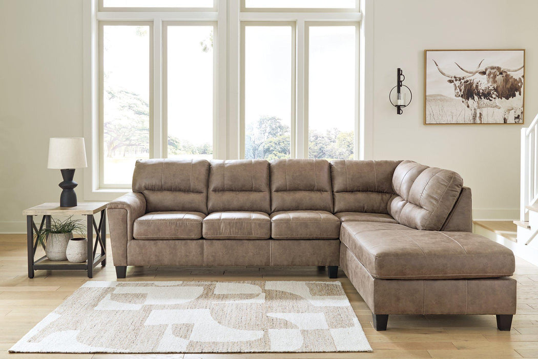 Navi 2-Piece Sectional Sofa Chaise - Premium Sectional from Ashley Furniture - Just $1044.08! Shop now at Furniture Wholesale Plus  We are the best furniture store in Nashville, Hendersonville, Goodlettsville, Madison, Antioch, Mount Juliet, Lebanon, Gallatin, Springfield, Murfreesboro, Franklin, Brentwood