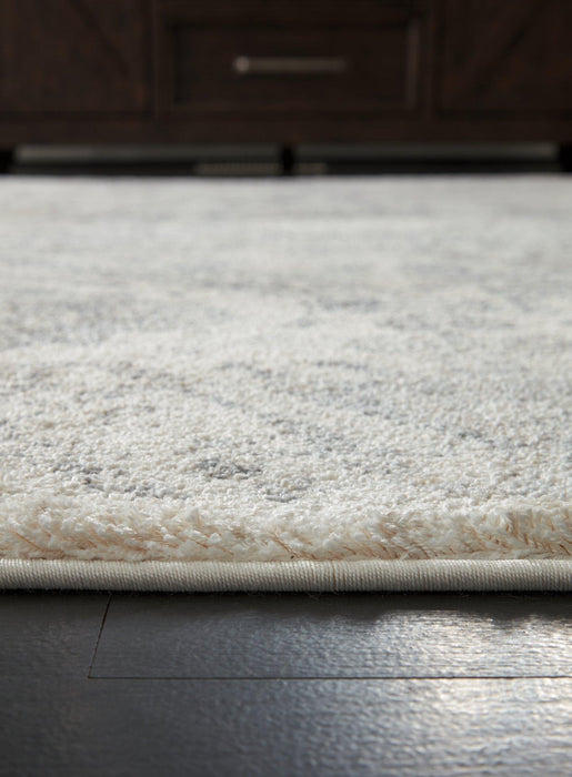 Precia 5'3" x 7'3" Rug - Premium Rug from Ashley Furniture - Just $240.42! Shop now at Furniture Wholesale Plus  We are the best furniture store in Nashville, Hendersonville, Goodlettsville, Madison, Antioch, Mount Juliet, Lebanon, Gallatin, Springfield, Murfreesboro, Franklin, Brentwood