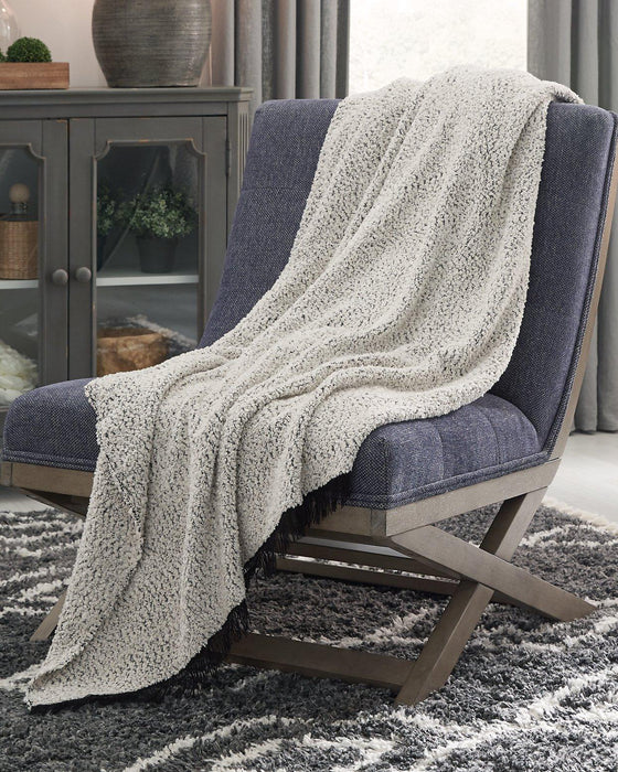 Leonita Throw (Set of 3) - Premium Throw from Ashley Furniture - Just $92.13! Shop now at Furniture Wholesale Plus  We are the best furniture store in Nashville, Hendersonville, Goodlettsville, Madison, Antioch, Mount Juliet, Lebanon, Gallatin, Springfield, Murfreesboro, Franklin, Brentwood