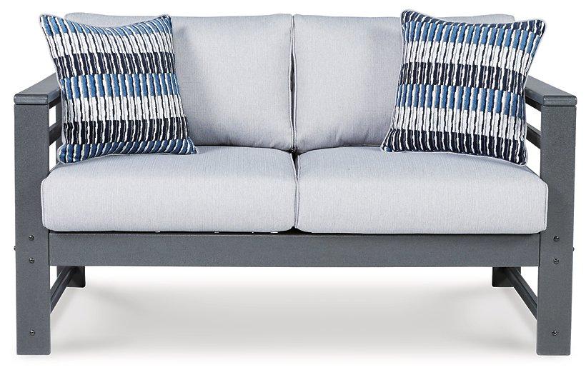 Amora Outdoor Loveseat with Cushion - Premium Outdoor Seating from Ashley Furniture - Just $606.48! Shop now at Furniture Wholesale Plus  We are the best furniture store in Nashville, Hendersonville, Goodlettsville, Madison, Antioch, Mount Juliet, Lebanon, Gallatin, Springfield, Murfreesboro, Franklin, Brentwood