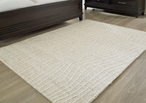 Varahill Rug - Premium Rug Medium from Ashley Furniture - Just $166.28! Shop now at Furniture Wholesale Plus  We are the best furniture store in Nashville, Hendersonville, Goodlettsville, Madison, Antioch, Mount Juliet, Lebanon, Gallatin, Springfield, Murfreesboro, Franklin, Brentwood